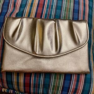 Small gold clutch